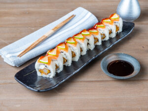 Ebi Katsu sushi roll topped with fresh salmon and lime at Paperfish Sushi, perfect for group dining Brickell featuring Nikkei cuisine